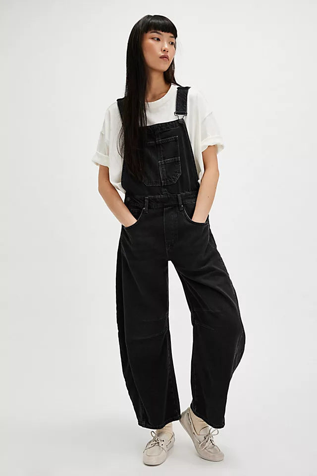 Front view of women's oversized casual overalls with multiple utility pockets, great for streetwear fashion.