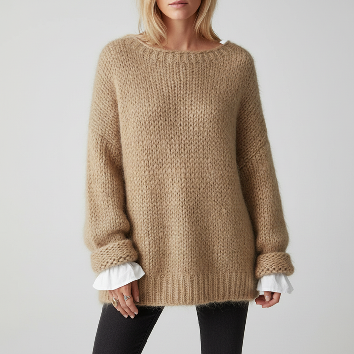 Stylish women's oversized knit jumper, perfect for fall fashion or spring layering.