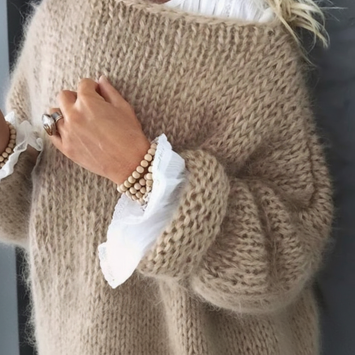 Comfortable women's relaxed fit oversized sweater, soft knit top for versatile casual style.