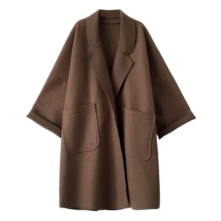 Chic oversized trench coat for women, a stylish and elegant outerwear essential for business casual attire.
