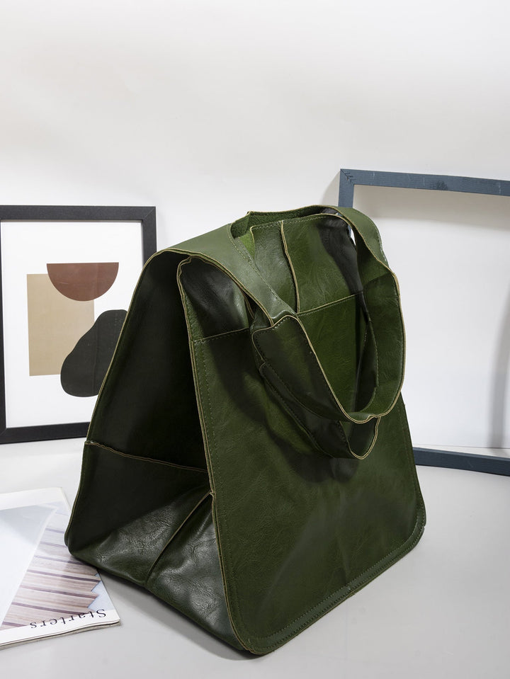 Modern women's oversized tote bag, a stylish and spacious everyday shoulder bag perfect for any occasion.