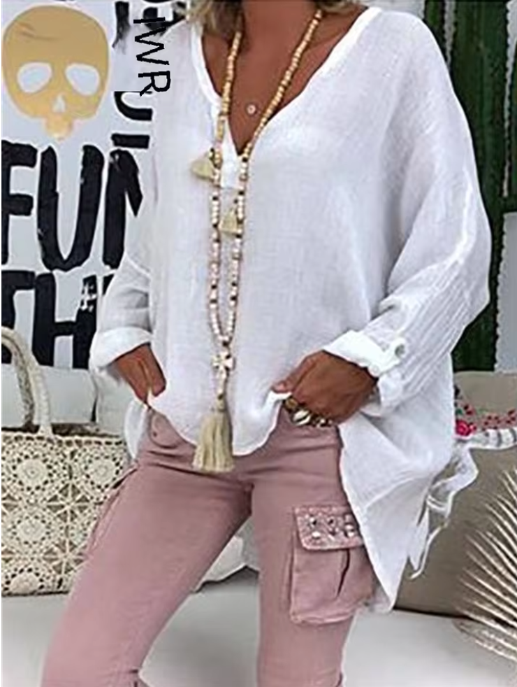 Light & airy oversized women's blouse with flowy design, great as a summer top or beach cover up.