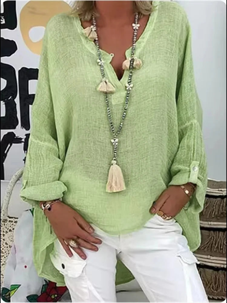 Comfortable women's oversized flowy shirt, a chic and relaxed fit top for any casual elegant look.
