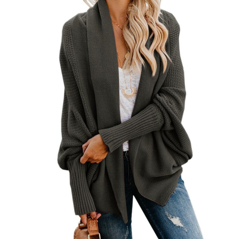 Cozy fall essential: women's oversized knit cardigan, perfect for comfortable stylish layering.