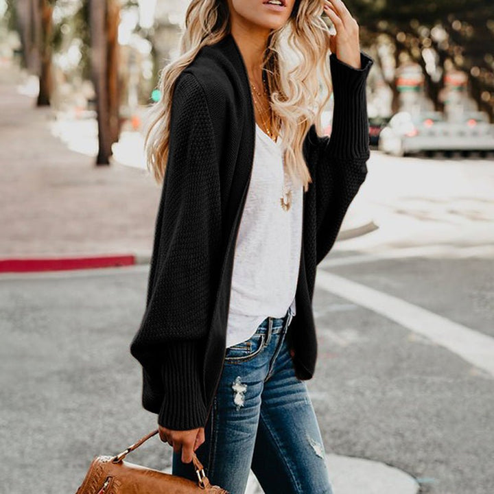 Cozy oversized women's cardigan, a versatile knitwear piece for fall and everyday comfort.