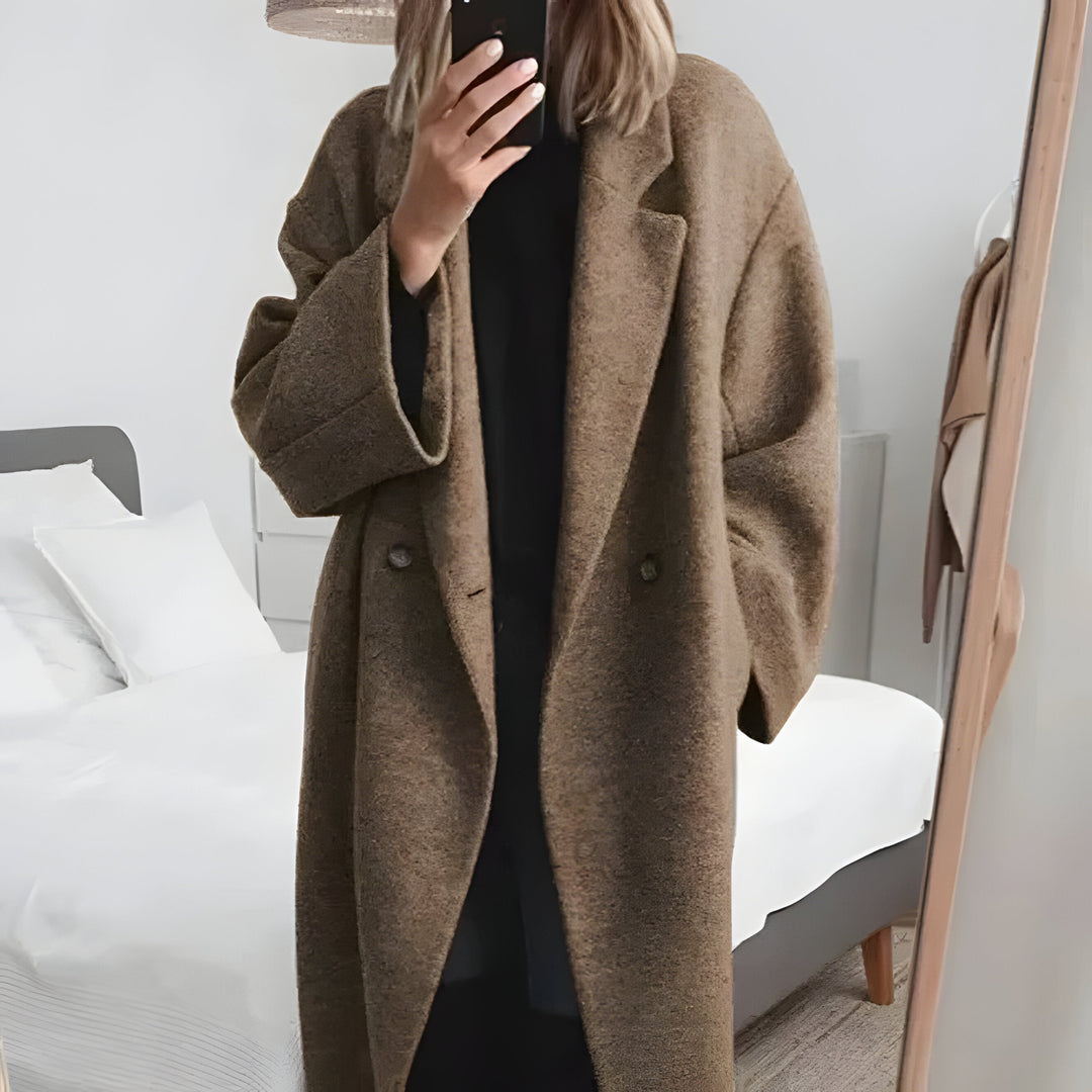 Warm women's oversized winter jacket with a chic lapel collar, designed for ultimate comfort in cold weather outerwear.
