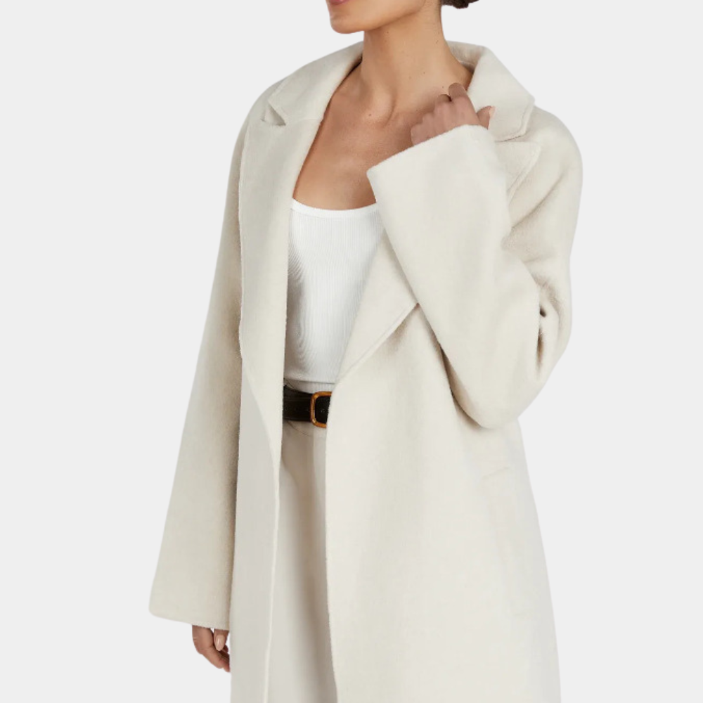 Classic women's long oversized trench coat with a cinching belt, great for formal or casual fall & spring outfits.