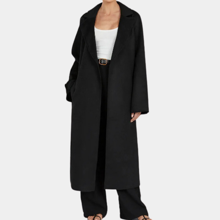 Elegant women's oversized long trench coat with adjustable belt, a modern twist on classic fall outerwear.