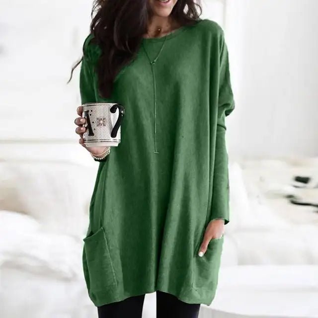 Comfortable women's oversized long sleeve tunic with pockets, ideal for versatile casual styling and layering.