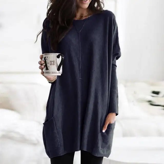 Relaxed fit women's long sleeve tunic top with functional pockets, an essential for casual everyday style.