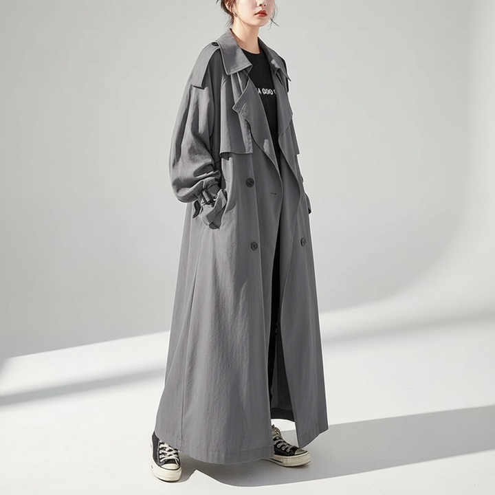 Comfortable women's oversized long trench coat. Stylish loose fit jacket, ideal for versatile fall & winter fashion.