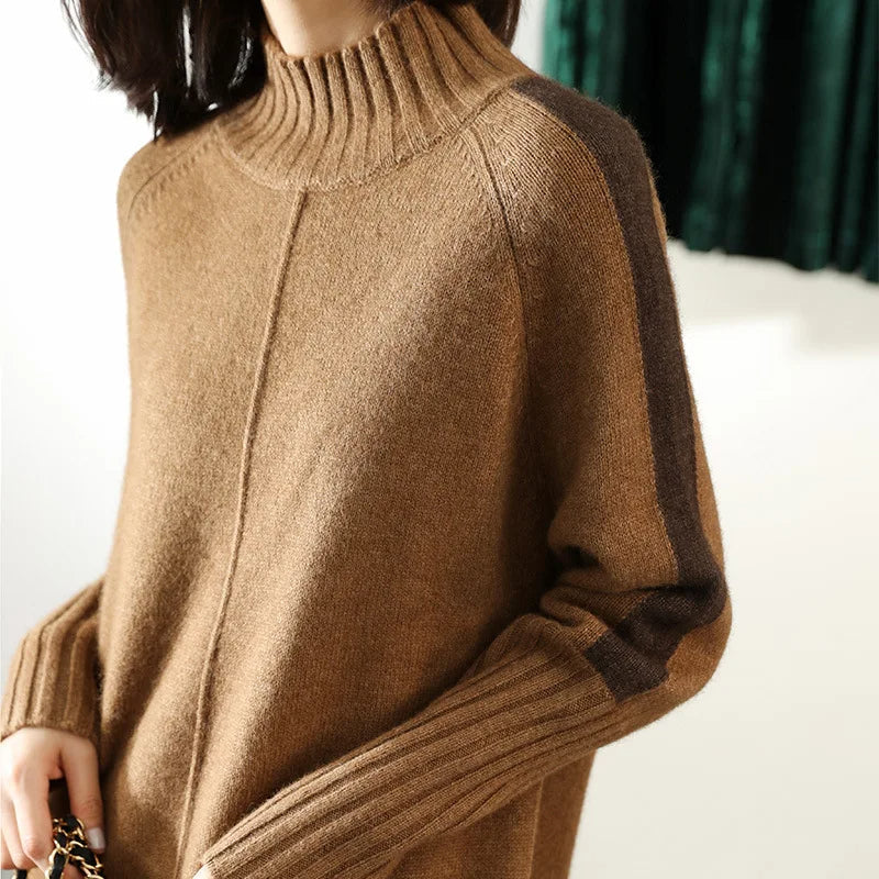 Chic women's long-sleeve oversized mock-neck sweater dress, featuring a stylish design and comfortable relaxed fit.