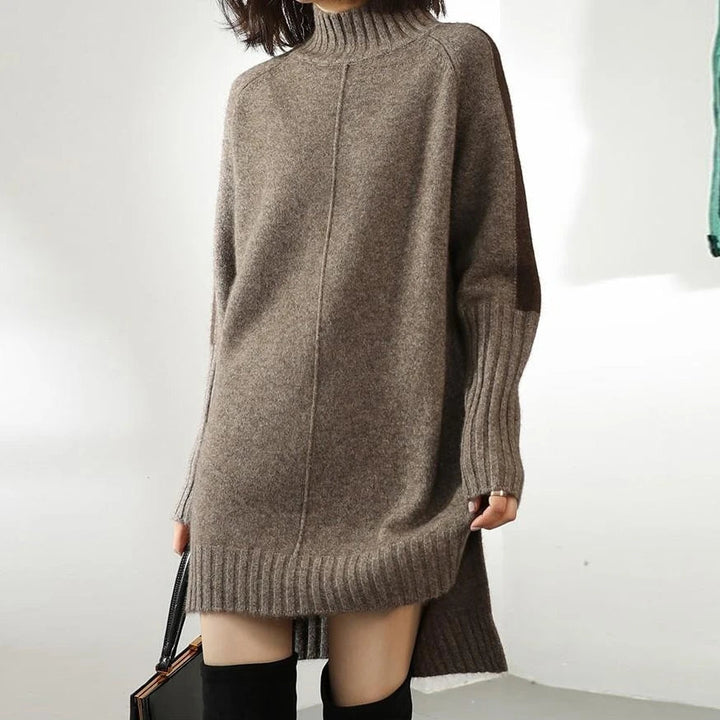 Comfortable women's oversized mock-neck sweater dress in a neutral tone, ideal for casual and chic winter fashion.