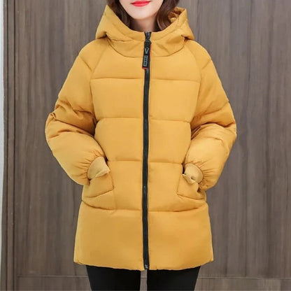 Women's oversized padded winter parka with hood, essential for ultimate warmth & style.