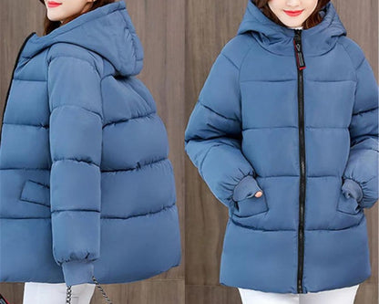 Plus size friendly women's oversized winter parka with hood, offering warmth and modern style.
