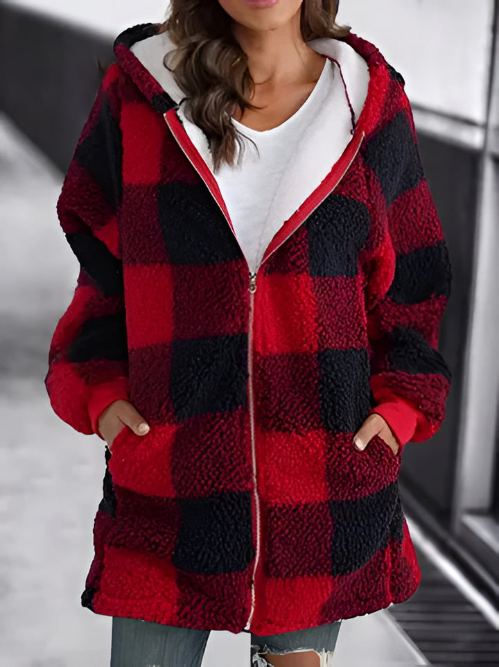 Plaid oversized hoodie for women, featuring a loose fit and long sleeves for comfortable streetwear.