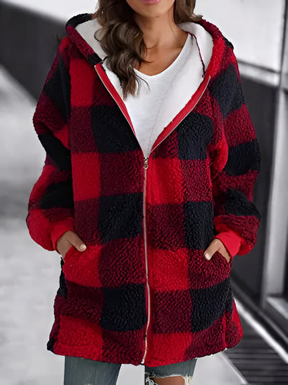 Plaid oversized hoodie for women, featuring a loose fit and long sleeves for comfortable streetwear.