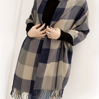 Cozy women's oversized plaid tassel scarf, a versatile fall & winter accessory for warmth and classic style.