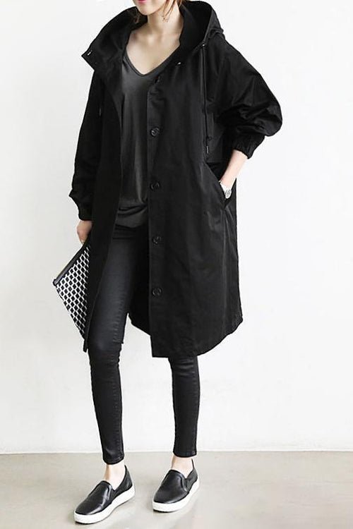 Stylish women's water resistant rain jacket. Oversized hooded trench coat perfect for spring and fall.