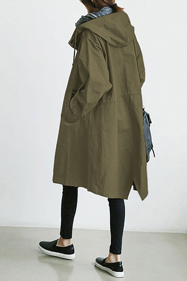Casual women's oversized parka. Water resistant trench coat, ideal layering piece for transitional weather.