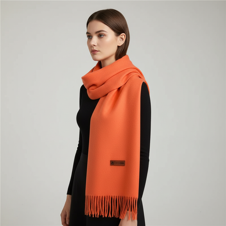 Ultra-soft oversized winter scarf for women, combining cozy fashion with elegant cold weather protection.