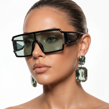 Stylish women's oversized square frame sunglasses, offering full UV400 protection & a chic outdoor look.
