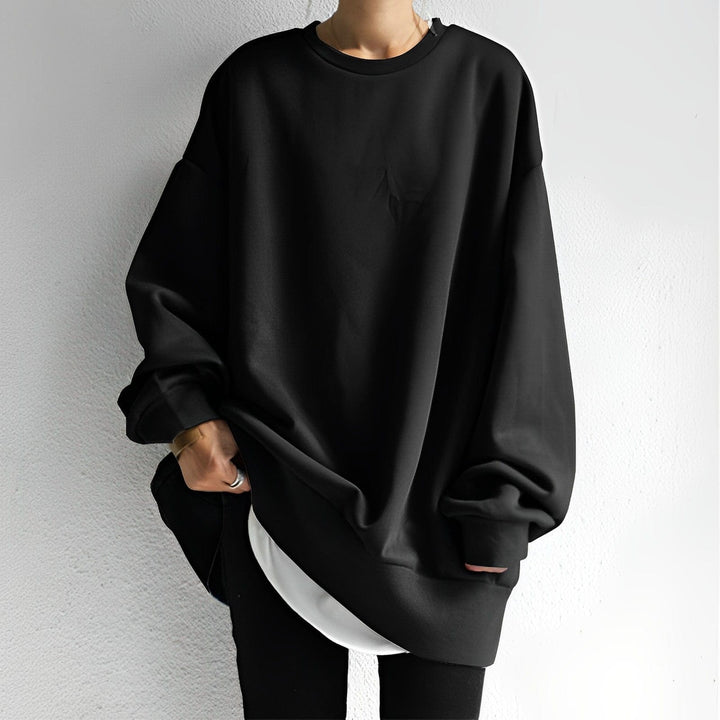 Stylish ladies' oversized sweatshirt with dropped shoulder design, great for relaxed casual wear.
