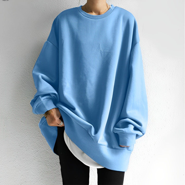 Soft women's oversized sweatshirt, a comfortable relaxed fit pullover, perfect for casual and cozy days.