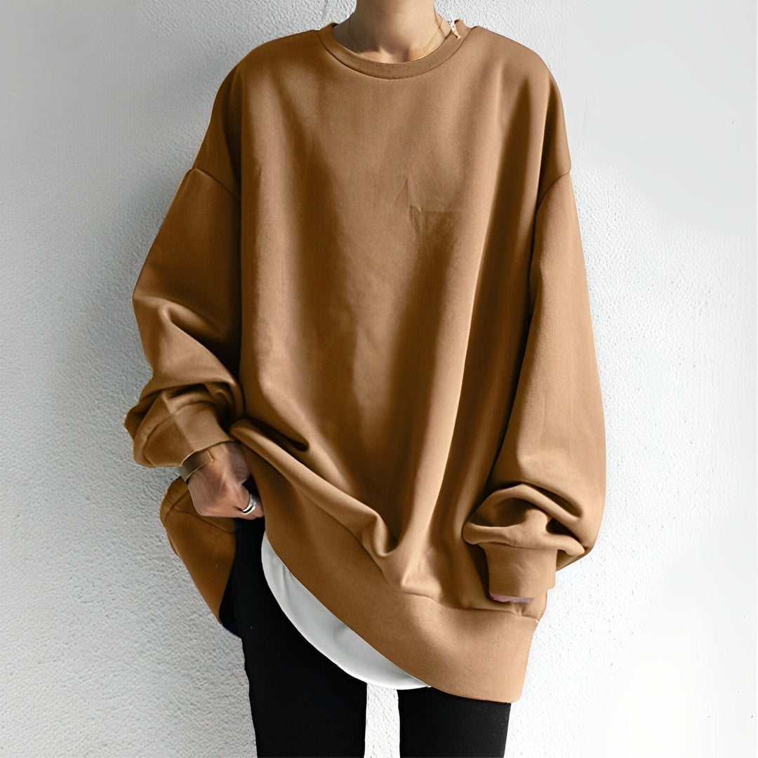 Women's oversized sweatshirt, relaxed fit, dropped shoulder, an essential for cozy loungewear & casual style.