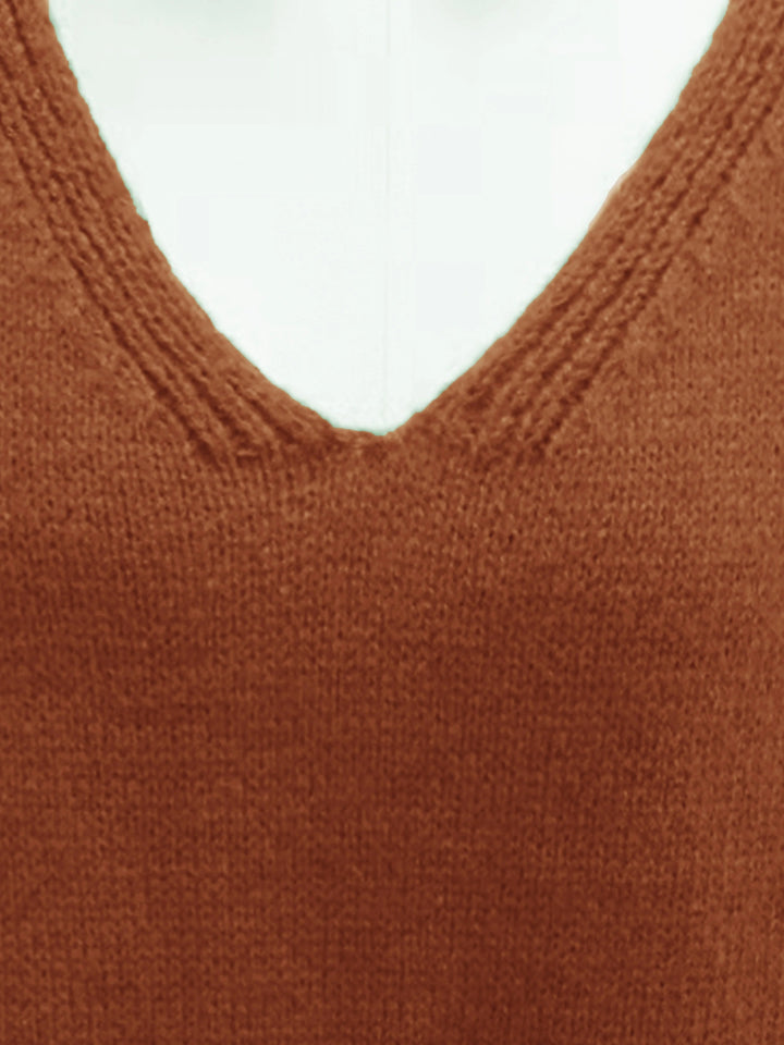 Versatile women's plus size oversized V-neck sweater. Long sleeve top for fall & winter styling.