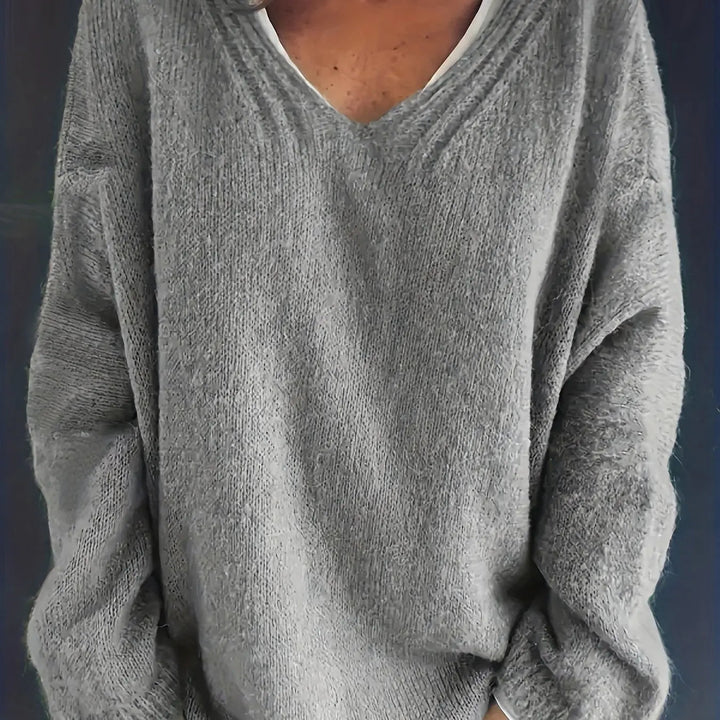 Cozy plus size V-neck oversized sweater for women. Perfect for fall & winter casual wear.