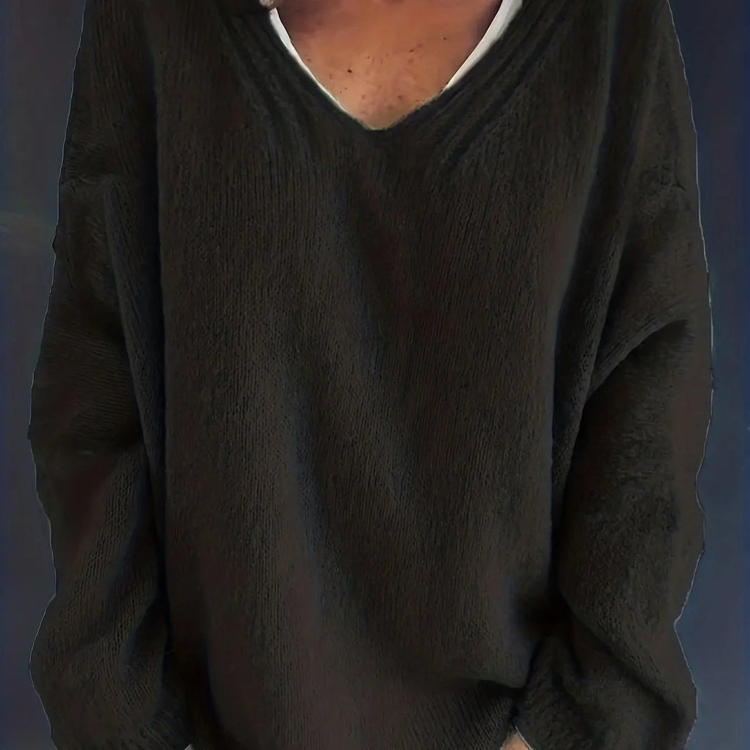 Stylish women's plus size oversized V-neck sweater. A chic, relaxed fit for fall & winter fashion.