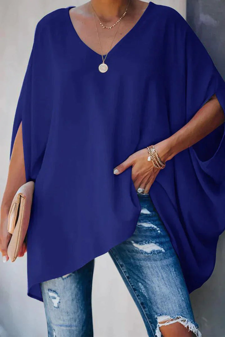 Relaxed fit women's V-neck tunic. Oversized design with comfortable batwing sleeves.