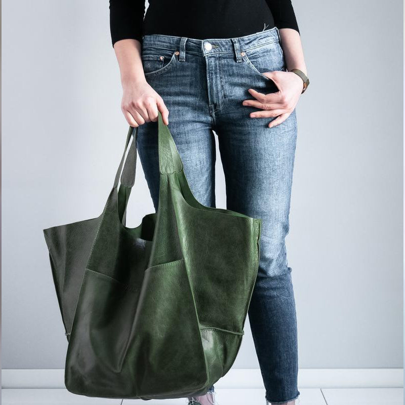 Modern vintage oversized leather shoulder bag for women, a blend of past and present style.