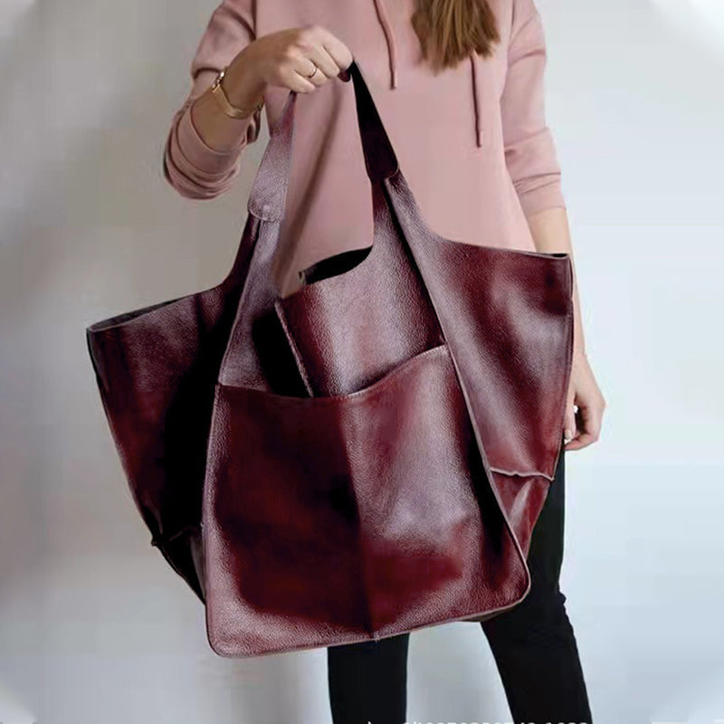Women's oversized vintage leather shoulder bag, a statement piece for daily fashion.