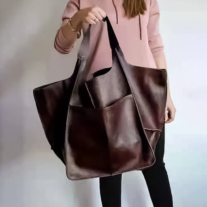 Classic women's oversized weekend travel bag, a versatile fashion accessory for her.