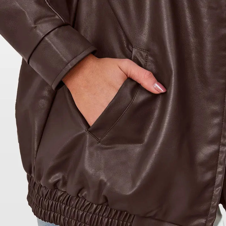 Fashion-forward women's zip jacket, oversized and modern. A chic, versatile layer for contemporary styling.