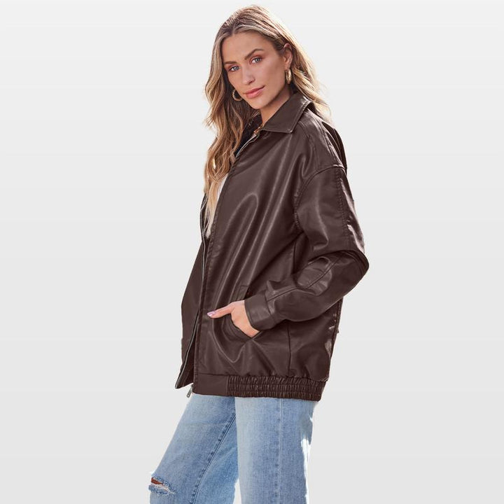 Edgy oversized zip jacket for women, modern design. A stylish statement piece for a relaxed, chic look.