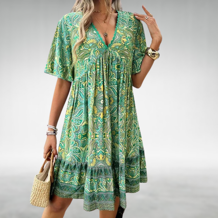Women's paisley boho mini dress with lace trim and ruffle hem, perfect for summer casual wear.
