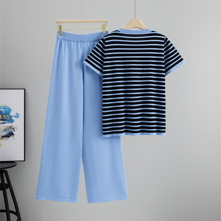 Casual women's Breton stripe lounge set, featuring a stylish top & wide-leg pants for a relaxed Parisian look.