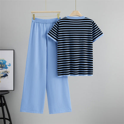 Casual women's Breton stripe lounge set, featuring a stylish top & wide-leg pants for a relaxed Parisian look.