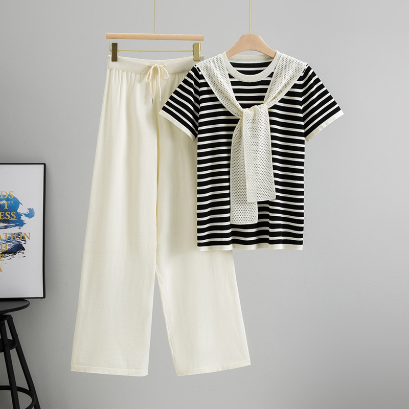 Comfortable women's two-piece lounge set with classic Breton stripes. Soft cotton blend, perfect for casual wear.
