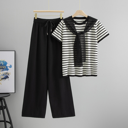 Elegant women's Breton stripe lounge set, soft cotton blend, comfortable top and wide-leg trousers for chic relaxation.