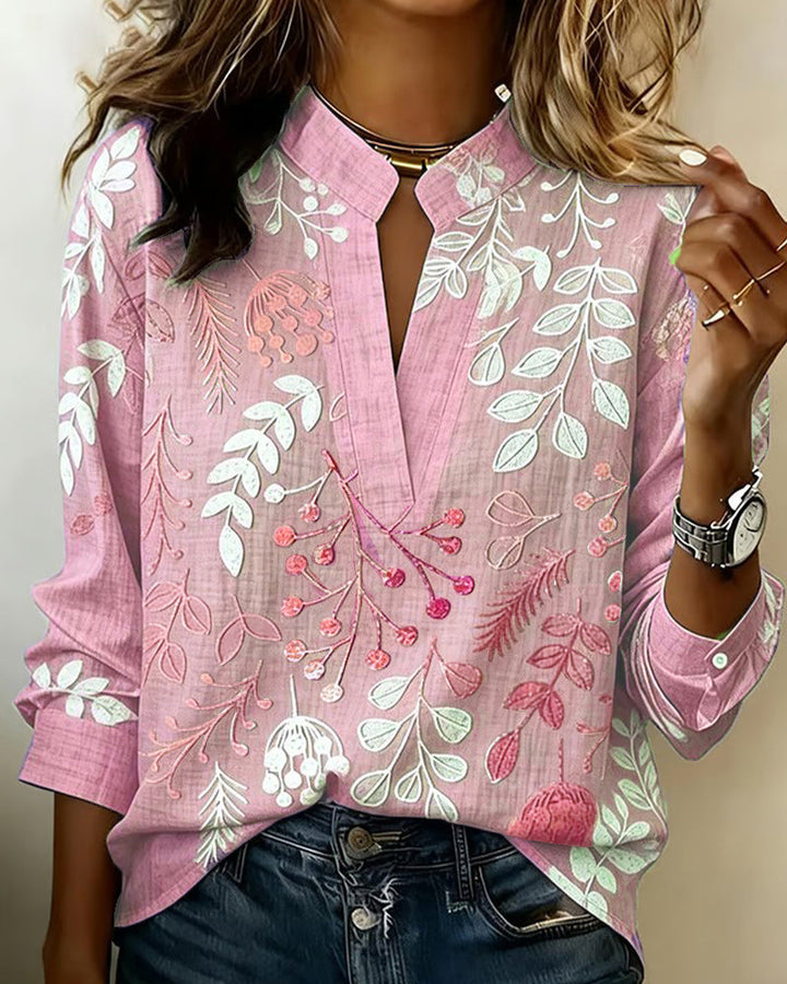 Chic women's blouse: pastel floral V-neck design, excellent for spring and casual elegance.