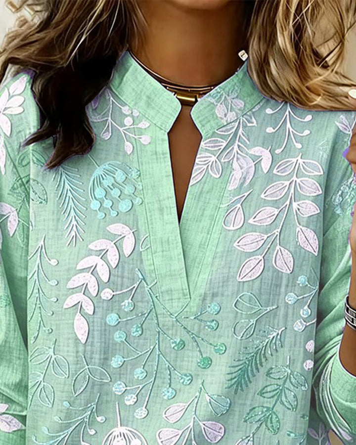 Women's casual chic pastel floral V-neck top, perfect for warm weather and versatile styling.
