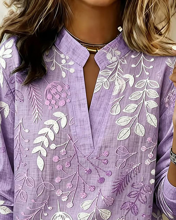 Lightweight women's pastel floral top, comfortable for warm weather & versatile fashion looks.