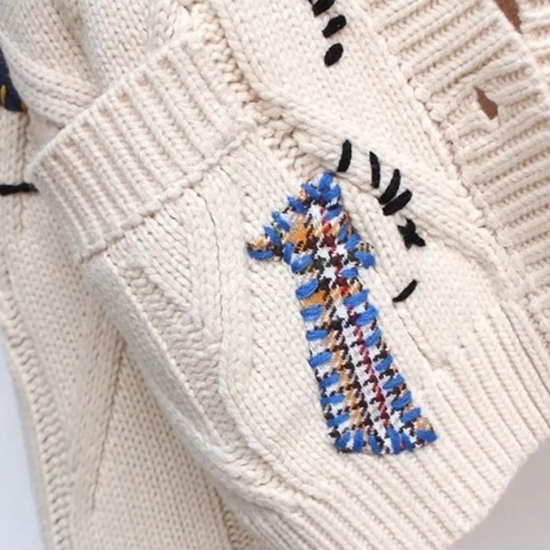 Elegant women's long textured cardigan in a vibrant Patcha design. Cozy & stylish for versatile fall outfits.