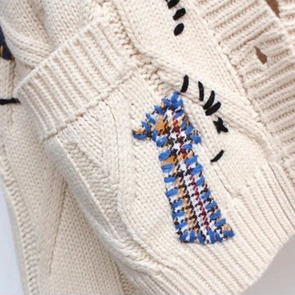 Elegant women's long textured cardigan in a vibrant Patcha design. Cozy & stylish for versatile fall outfits.