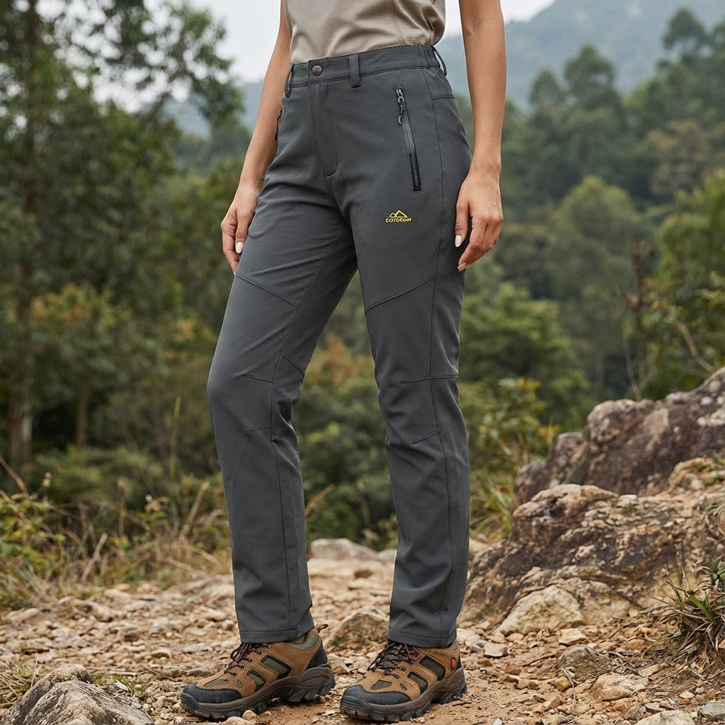 Women's Patricia waterproof outdoor pants, fleece-lined for warmth. Ideal weatherproof hiking & trekking gear.