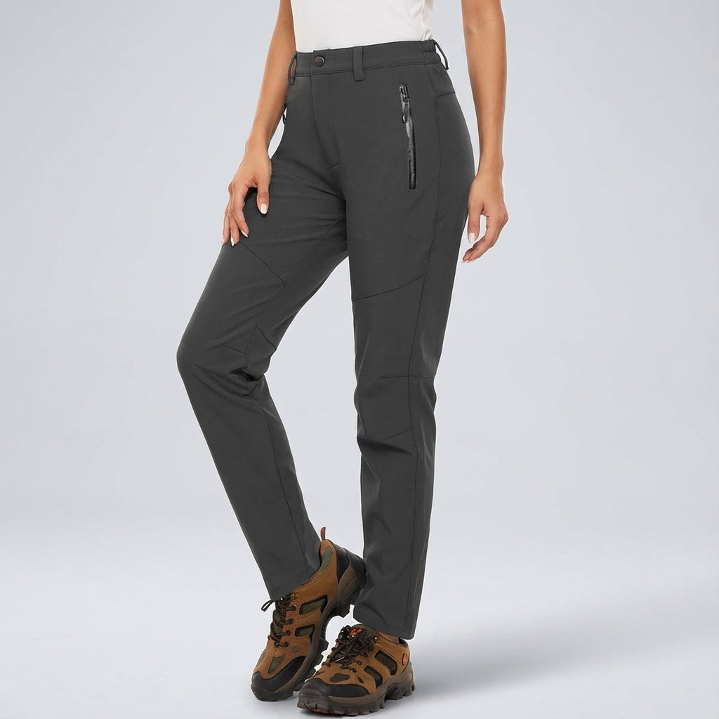 Stylish women's activewear: Patricia weatherproof outdoor pants, perfect for trekking & warm adventures.